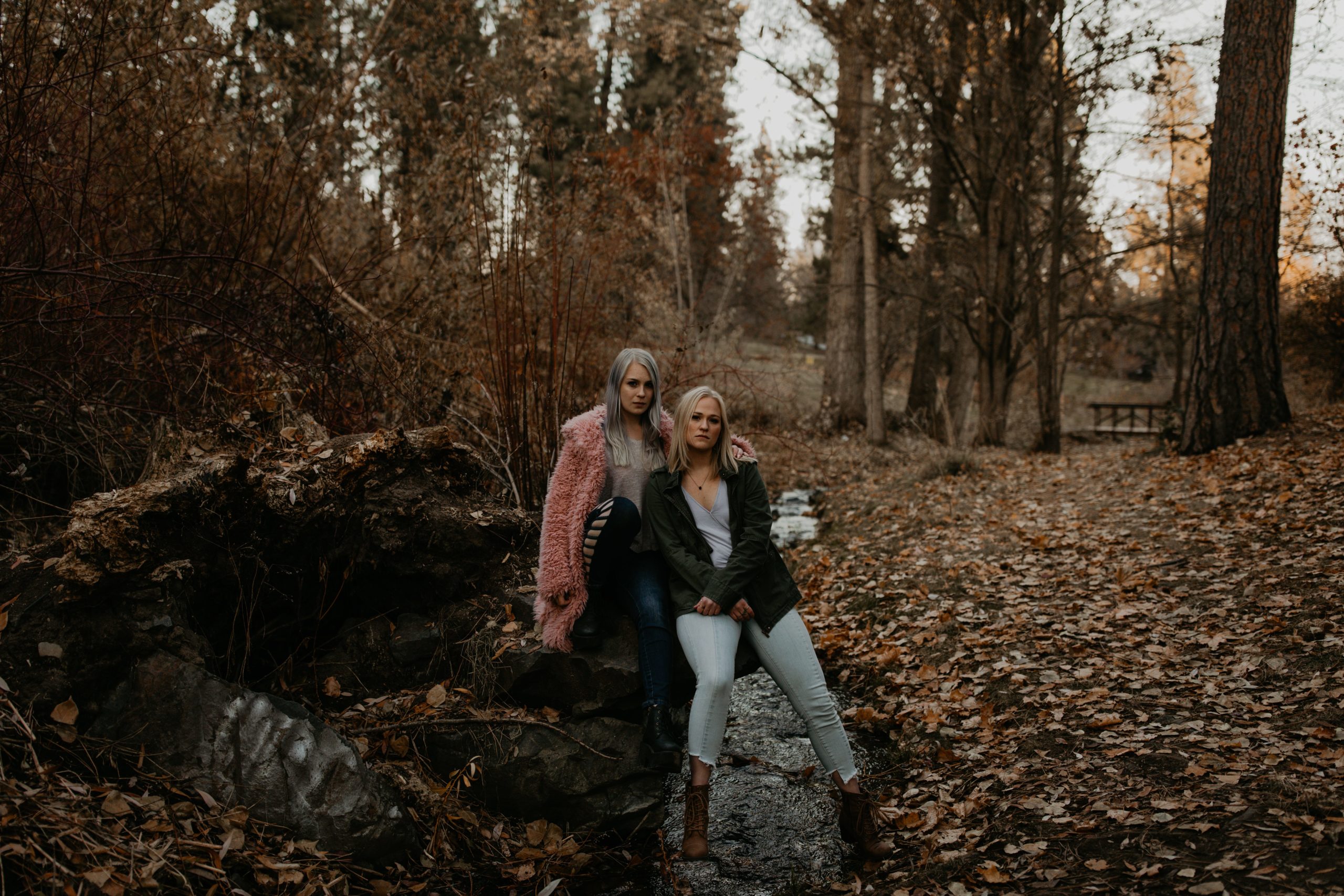 women posing for a moody fall photo