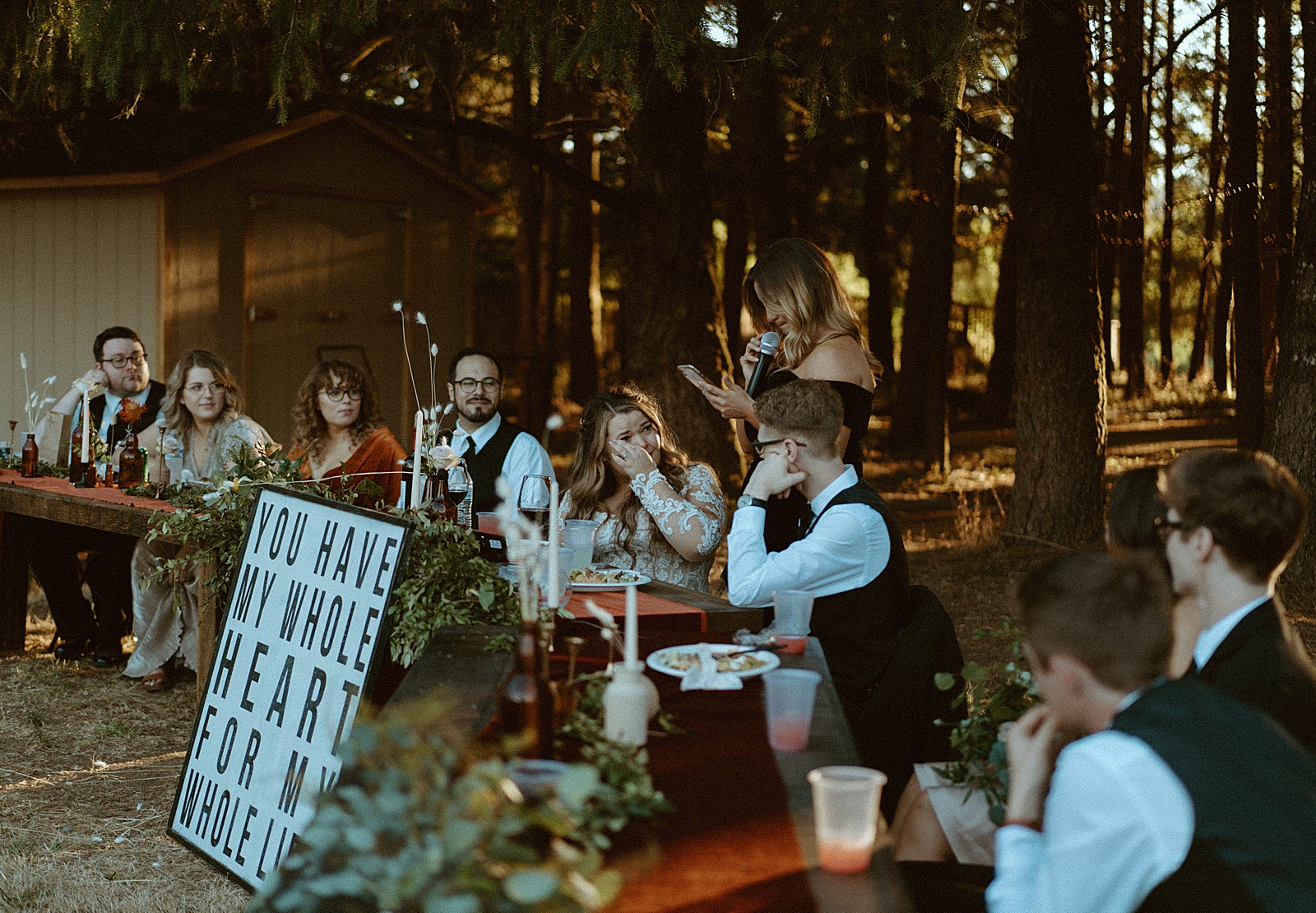 guests giving toasts at Oregon wedding captured by Danielle Johnson Photography